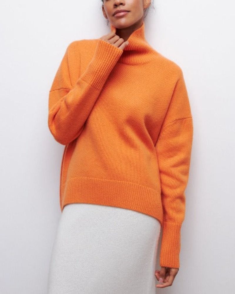 Blusa Feminina Oversized Gola Alta Dobrável
