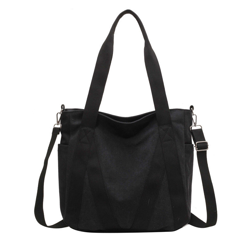 Bolsa de lona com faixas contrastantes e alça regulável — Bene Donna — imagem 09