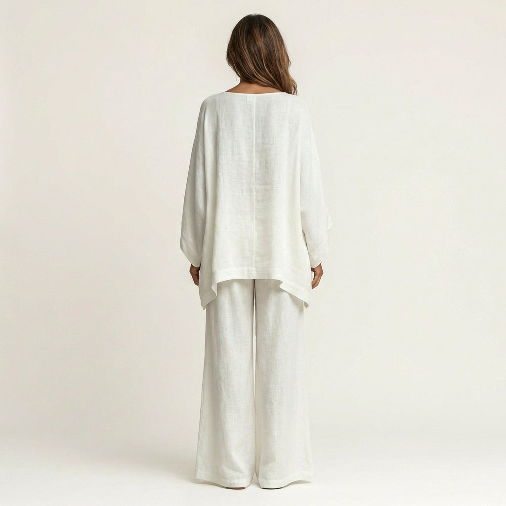 Conjunto de blusa assimétrica fluida e calça de pernas amplas — Bene Donna — imagem 02