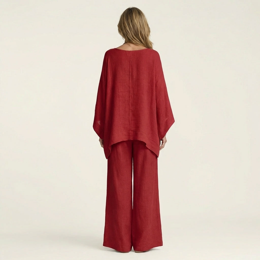 Conjunto de blusa assimétrica fluida e calça de pernas amplas — Bene Donna — imagem 06