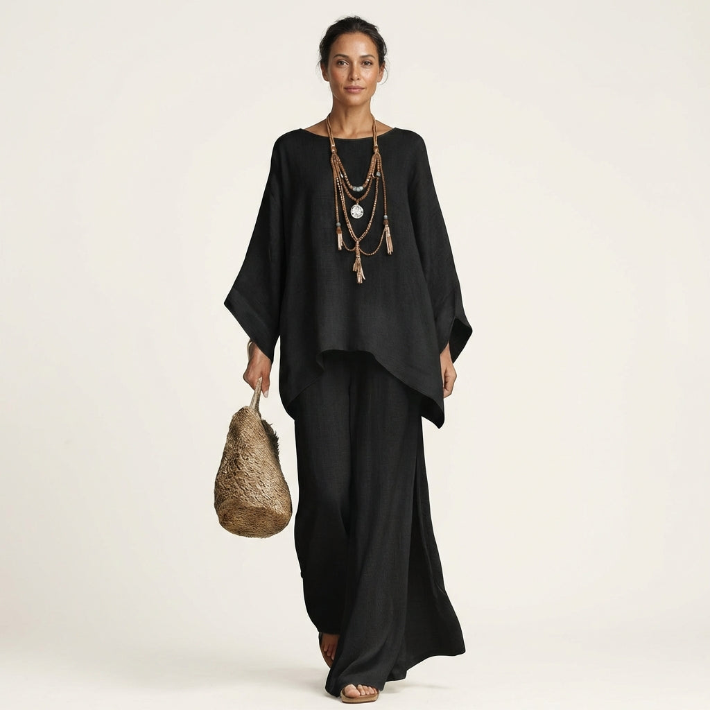 Conjunto de blusa assimétrica fluida e calça de pernas amplas — Bene Donna — imagem 09