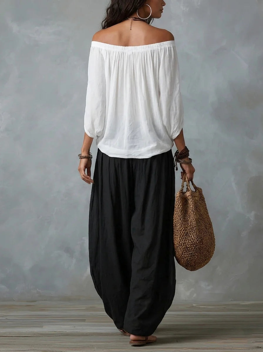 Conjunto de blusa assimétrica ombro a ombro e calça ampla — Bene Donna — imagem 02