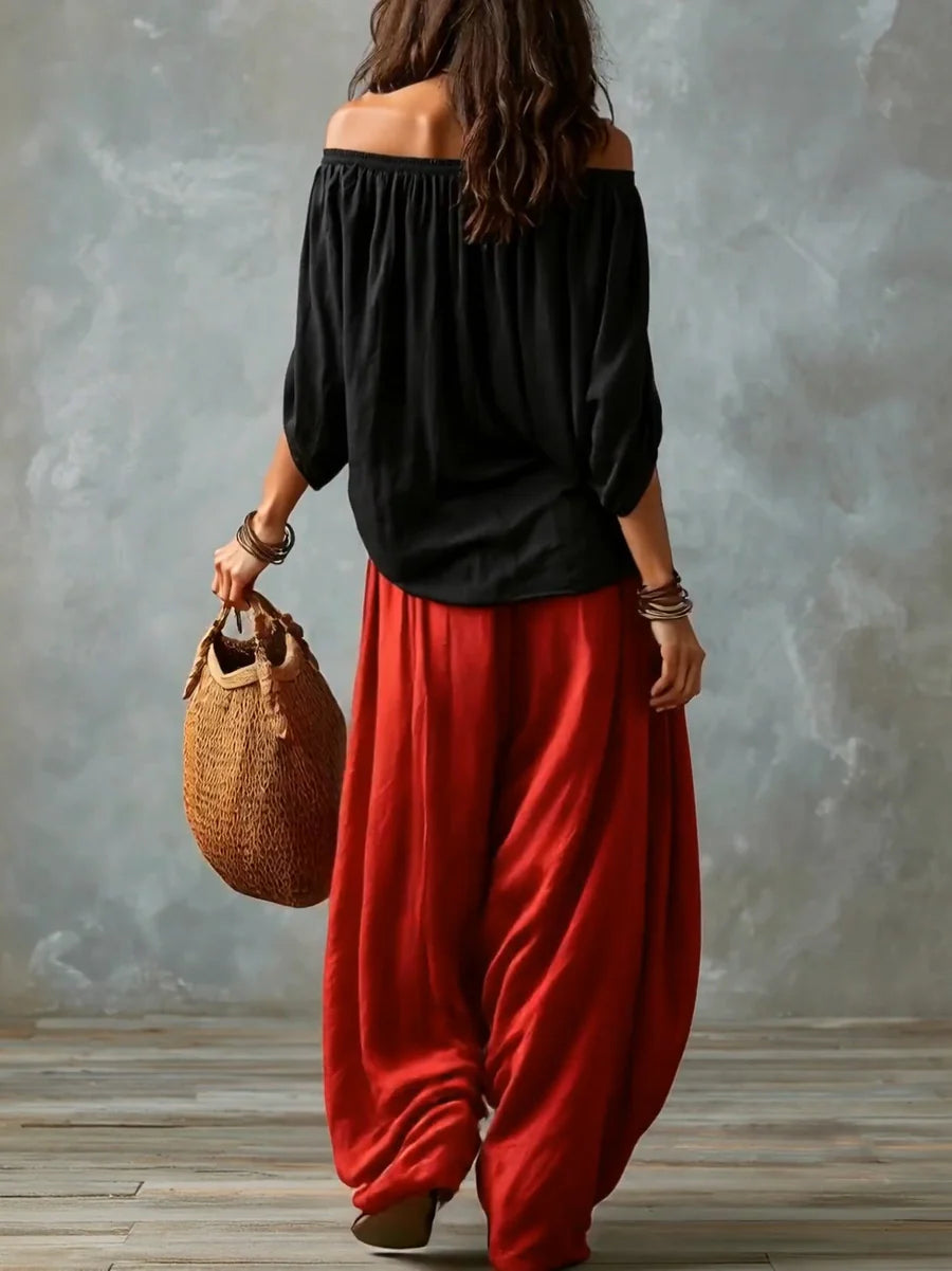 Conjunto de blusa assimétrica ombro a ombro e calça ampla — Bene Donna — imagem 04