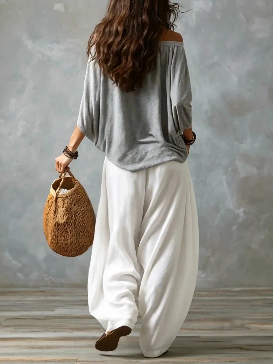 Conjunto de blusa assimétrica ombro a ombro e calça ampla — Bene Donna — imagem 06