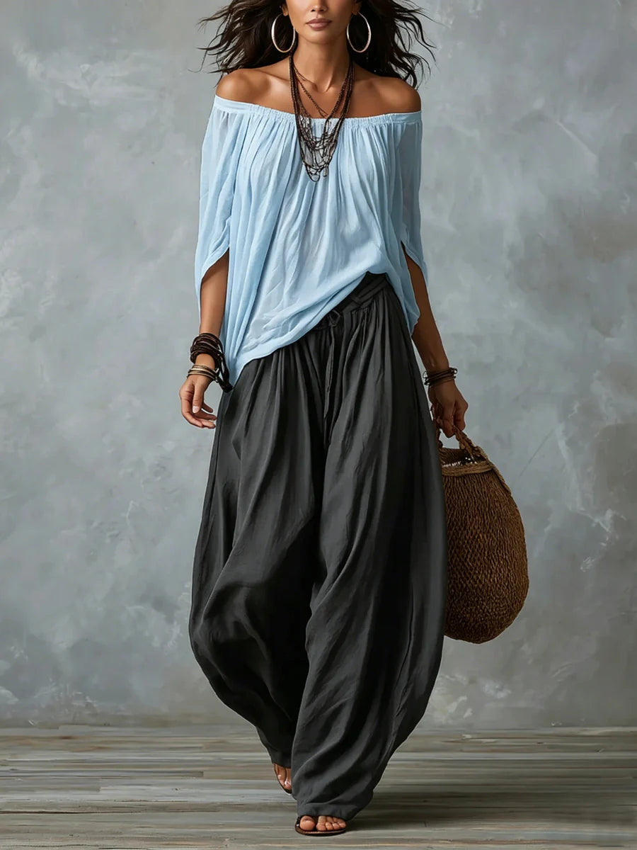 Conjunto de blusa assimétrica ombro a ombro e calça ampla — Bene Donna — imagem 07