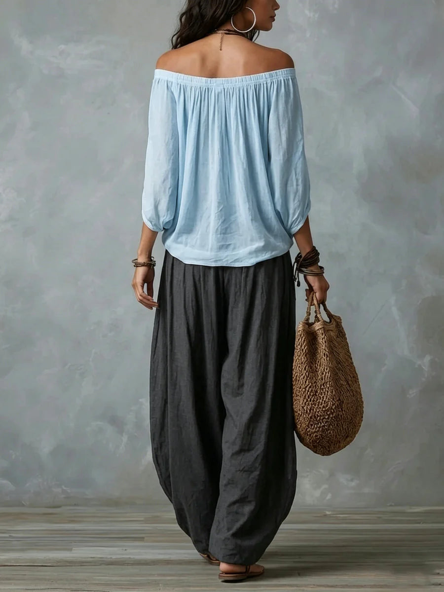 Conjunto de blusa assimétrica ombro a ombro e calça ampla — Bene Donna — imagem 08