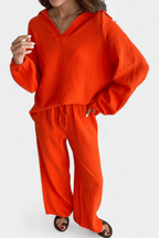 Conjunto de blusa de mangas longas com decote V e pantalona — Bene Donna — imagem 04