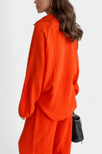 Conjunto de blusa de mangas longas com decote V e pantalona — Bene Donna — imagem 06