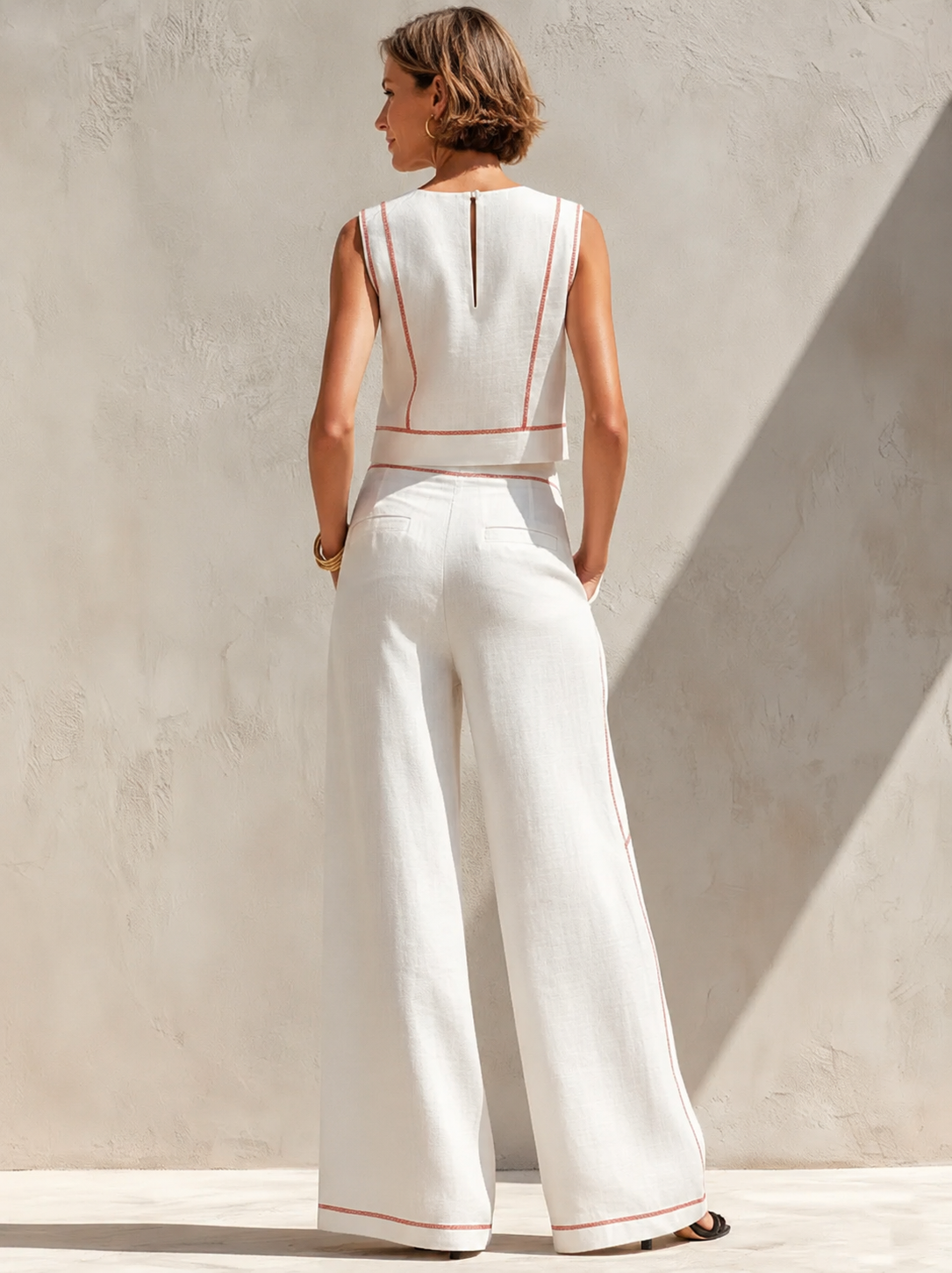 Conjunto de blusa sem mangas e pantalona de caimento fluido — Bene Donna — imagem 05