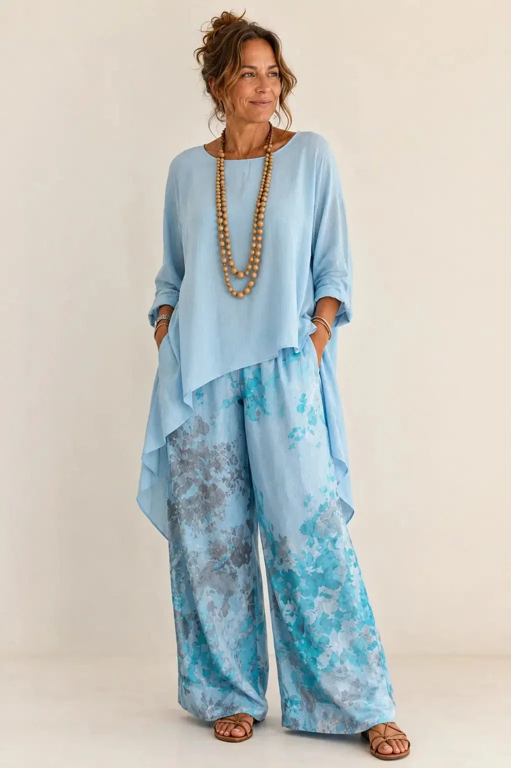 Conjunto floral de túnica assimétrica e pantalona com elástico — Bene Donna — imagem 01