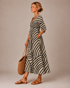 Vestido longo com listras onduladas e mangas três quartos — Bene Donna — imagem 02